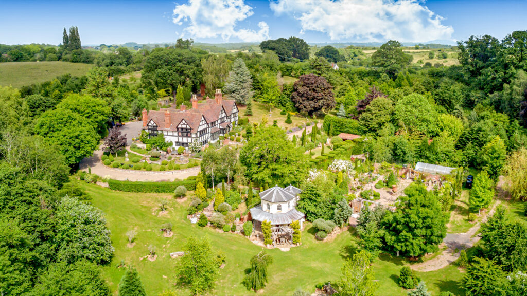 Manor house within generous gardens and grounds